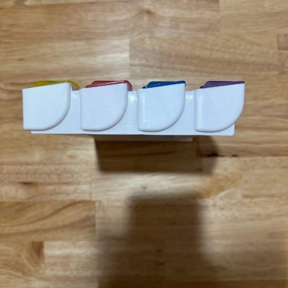 Weekly Pill Organizer with Color-Coded Compartments